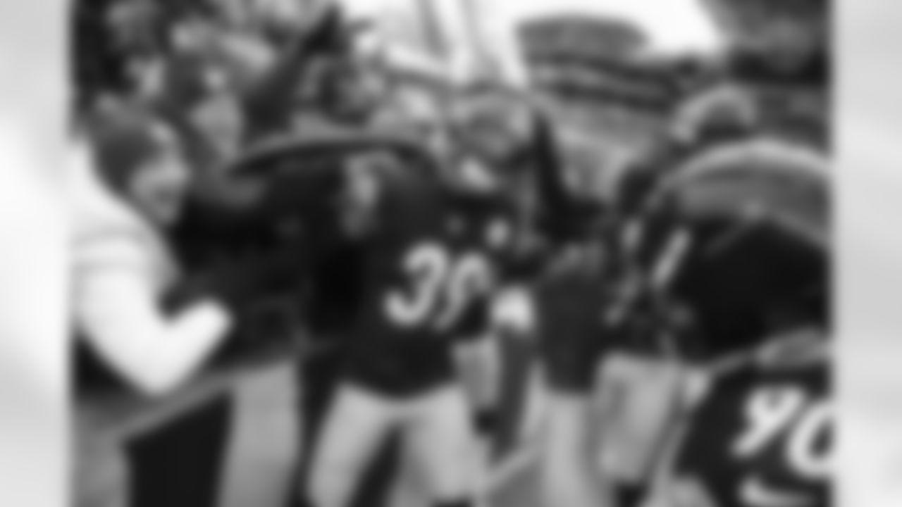 Pittsburgh Steelers safety Minkah Fitzpatrick (39) celebrates with fans and teammates after a fumble recovery during the Week 15 game against the Titans. I love the emotion from the fans and Minkah while T.J. Watt is trying to steal my job and capture the moment with his own "camera." (Caitlyn Epes / Pittsburgh Steelers)